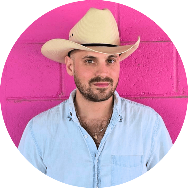 This is a headshot of SAY Sí staff member Alex Casso